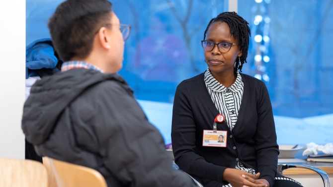 Dr. Gloria James Manyangu, a Ph.D. candidate at Weill Bugando School of Medicine and director of community health at Bugando Medical Centre, speaks to a Ph.D. student at Weill Cornell Medicine.